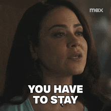 a woman is saying " you have to stay " in a max ad