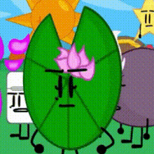 a green leaf with a flower on it 's face