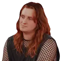 a woman with red hair is wearing a black fishnet top