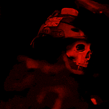 a man with a skull on his face wearing a helmet