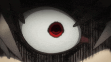a close up of a person 's eye with a red circle in the middle