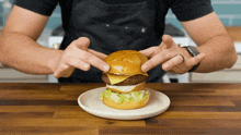 Putting The Bun On Top Internet Shaquille GIF - Putting The Bun On Top Internet Shaquille Preparing A Burger GIFs
