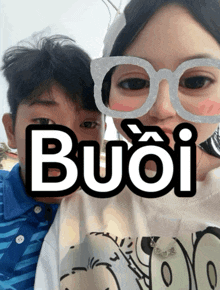 a boy and a girl wearing glasses with the word buoi on the bottom