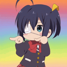 a girl with a bandage on one eye is pointing