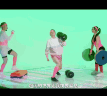 a woman is holding a dumbbell that says kg