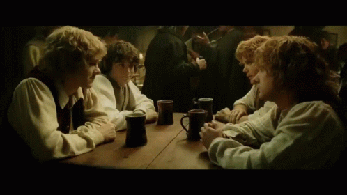 Hobbits toasting beers