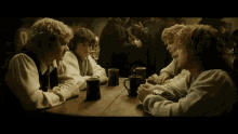 Hobbit Cheers GIF - Hobbit Cheers Drinks GIFs