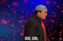 a woman in a suit and tie says 000 girl