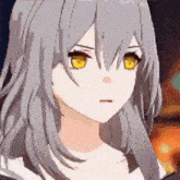 a close up of a girl with long gray hair and yellow eyes .