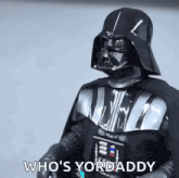 darth vader from star wars is wearing a helmet and cape and says `` who 's yordaddy '' .