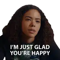 a woman with curly hair has the words i 'm just glad you 're happy on her face