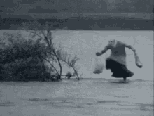 person falling into water gif