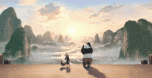 a panda and a fox are standing on top of a cliff looking at the sunset .