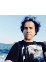 a man wearing a black shirt with a picture of an eagle on it