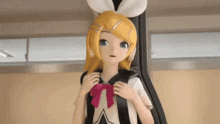 a girl with blonde hair and a pink bow is standing in a room