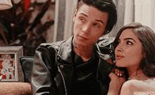 andy black with a girl looking around