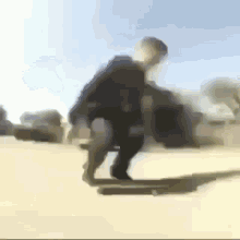 a blurry image of a person on a skateboard