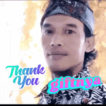a man is wearing a headband and says thank you gifnya