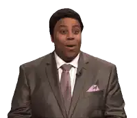 a man in a suit and tie with a purple pocket square