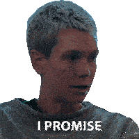 a woman says i promise while wearing a grey sweater