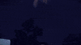 a glowing light is coming out of a broken glass .