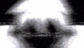 a black and white image of a skull with a light behind it