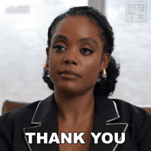 a woman is giving a thank you gesture