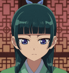 a girl with green hair and blue eyes looks angry