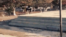 a skateboarder is doing a trick on a ramp