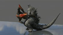 two monsters are fighting each other on a table