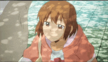 a girl with brown hair is smiling in a cartoon