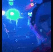 a blurry picture of a person dancing in a club