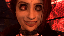 a close up of a girl 's face with red eyes