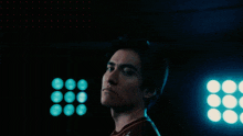 a man in a red shirt with a lg logo on it
