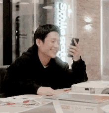 Jung Hae In Giggling On Phone GIF - Jung Hae In Giggling On Phone Giggling GIFs