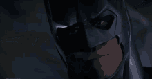 a person in a leather glove is holding a knife in their hand .