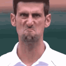 Novak Djokovic Scowl GIF - Novak Djokovic Scowl Tennis GIFs
