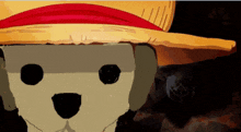 a dog wearing a straw hat with a red band