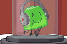 a green cartoon character wearing headphones and a smiley face
