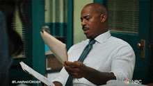 Checking Some Documents Detective Jalen Shaw GIF - Checking Some Documents Detective Jalen Shaw Law & Order GIFs