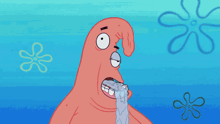 patrick star from spongebob squarepants is crying with a flower behind him