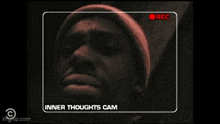 a man in a beanie is being recorded and says i want some crack