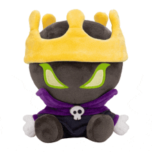 a stuffed animal with a yellow crown and a skull on it