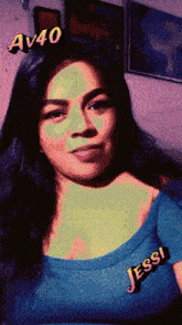 a woman in a blue shirt with the name jessi on her chest