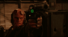 Hellboy Aim GIF - Hellboy Aim Shoot GIFs