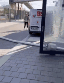 a white van with the letter b on the side
