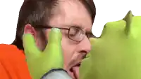 shrek licking a man 's face with his tongue out