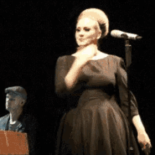 Adele Shoulder Brush GIF - Adele Shoulder Brush Dance GIFs