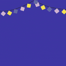 arabic writing on a blue background with a string of lights