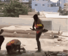 a woman standing on a roof with nbl and laf written on the bottom